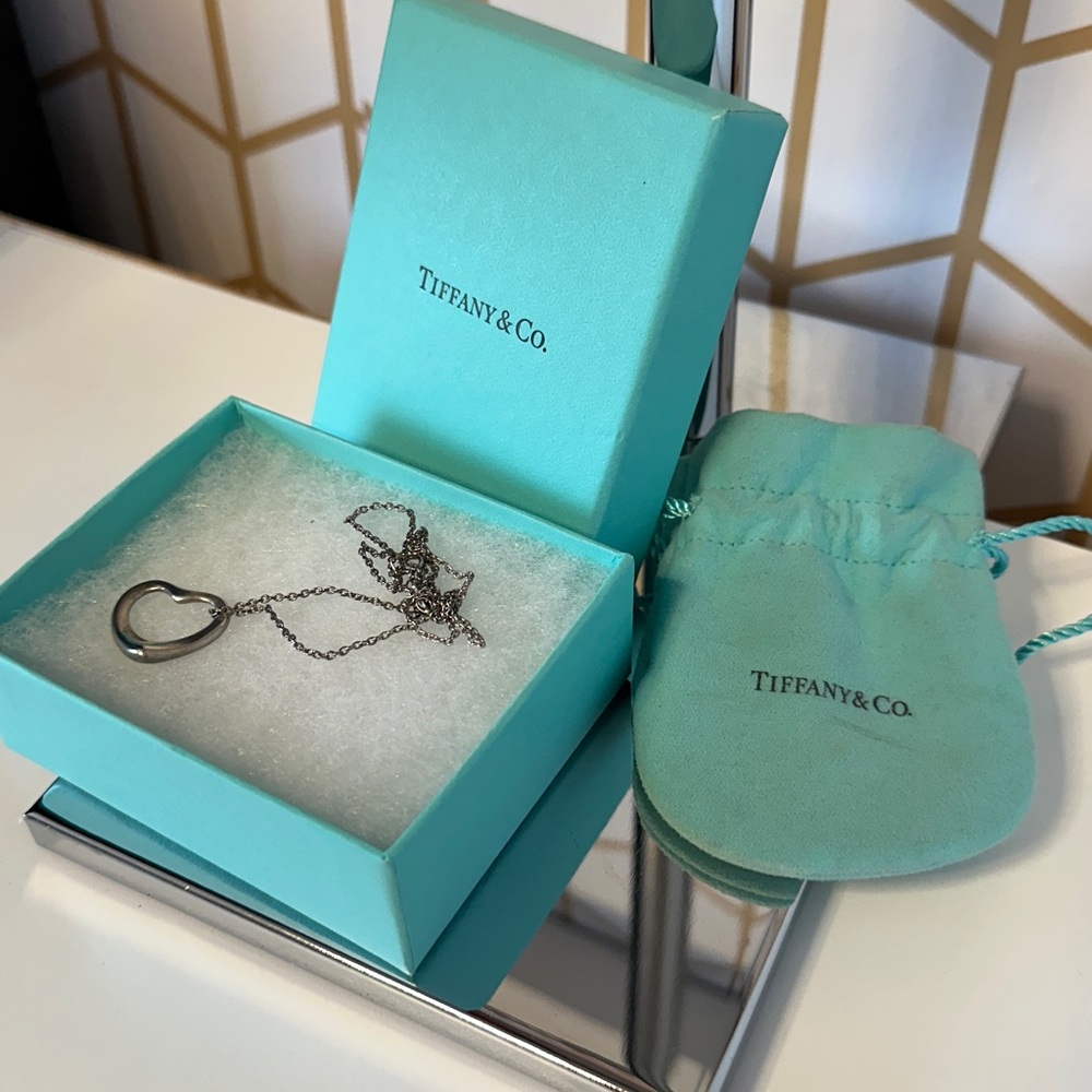 Tiffany Elsa Peretti Open Heart Necklace 22mm. Comes with pouch and box.